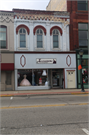 215 E MAIN ST, a Italianate retail building, built in Watertown, Wisconsin in 1874.