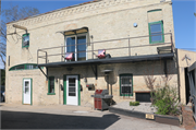 314 E MADISON ST, a Commercial Vernacular livery/stable, built in Watertown, Wisconsin in 1880.