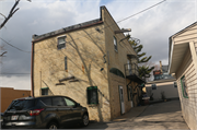 314 E MADISON ST, a Commercial Vernacular livery/stable, built in Watertown, Wisconsin in 1880.