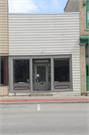 111 S 3RD ST, a Commercial Vernacular small retail building, built in Watertown, Wisconsin in 1865.