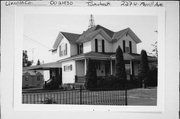 227 W MERRILL AVE, a Queen Anne house, built in Tomahawk, Wisconsin in 1900.