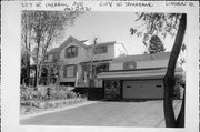 227 W MERRILL AVE, a Queen Anne house, built in Tomahawk, Wisconsin in 1900.
