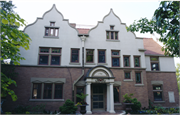 166 N PROSPECT AVE, a Dutch Colonial Revival house, built in Madison, Wisconsin in 1905.