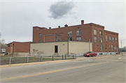 233 W DIVISION ST, a Astylistic Utilitarian Building dairy processing facility, built in Fond du Lac, Wisconsin in 1915.
