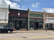 141-145 S KNOWLES AVE, a Commercial Vernacular retail building, built in New Richmond, Wisconsin in 1900.