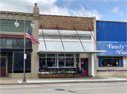 137 S KNOWLES AVE, a Commercial Vernacular retail building, built in New Richmond, Wisconsin in 1899.