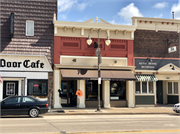 208-214 S KNOWLES AVE, a Commercial Vernacular tavern/bar, built in New Richmond, Wisconsin in 1899.