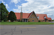1180 8TH AVE, a Late Gothic Revival church, built in Cumberland, Wisconsin in 1961.