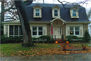 2011 VAN HISE AVE, a Dutch Colonial Revival house, built in Madison, Wisconsin in 1915.