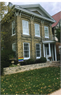 1136 MAIN ST, a Greek Revival house, built in Racine, Wisconsin in 1852.