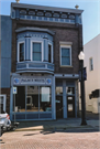 17 W MAIN ST, a Queen Anne small retail building, built in Evansville, Wisconsin in 1903.