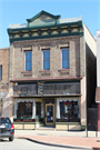 1103 N 8th St, a Queen Anne small retail building, built in Sheboygan, Wisconsin in 1884.