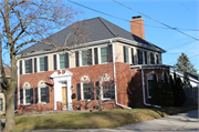 1909 S 9th St, a Colonial Revival/Georgian Revival house, built in Sheboygan, Wisconsin in 1928.