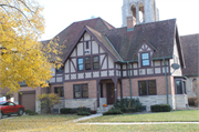 1125 N 6th St and 523 St Clair Ave, a Late Gothic Revival church, built in Sheboygan, Wisconsin in 1954.