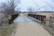 Elroy-Sparta State Trail, 0.6 mi NW of CTH PP, a NA (unknown or not a building) steel beam or plate girder bridge, built in Plymouth, Wisconsin in 1873.