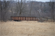 Elroy-Sparta State Trail, 0.6 mi NW of CTH PP, a NA (unknown or not a building) steel beam or plate girder bridge, built in Plymouth, Wisconsin in 1873.