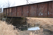 Elroy-Sparta State Trail, 0.6 mi NW of CTH PP, a NA (unknown or not a building) steel beam or plate girder bridge, built in Plymouth, Wisconsin in 1873.