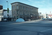 1 N PINCKNEY ST, a Italianate retail building, built in Madison, Wisconsin in 1871.