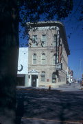 1 N PINCKNEY ST, a Italianate retail building, built in Madison, Wisconsin in 1871.