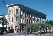 1 N PINCKNEY ST, a Italianate retail building, built in Madison, Wisconsin in 1871.