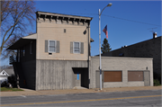 1628 COMMERCIAL ST, a Commercial Vernacular retail building, built in Bangor, Wisconsin in 1875.