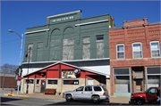 1544-1546 COMMERCIAL ST, a Romanesque Revival opera house/concert hall, built in Bangor, Wisconsin in 1899.