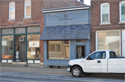 1535 COMMERCIAL ST, a Commercial Vernacular small retail building, built in Bangor, Wisconsin in 1905.