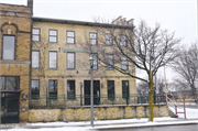 607-609 W VIRGINIA ST, a Federal row house/townhouse, built in Milwaukee, Wisconsin in 1850.