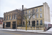 607-609 W VIRGINIA ST, a Federal row house, built in Milwaukee, Wisconsin in 1850.