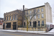 607-609 W VIRGINIA ST, a Federal row house/townhouse, built in Milwaukee, Wisconsin in 1850.