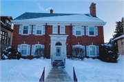 4811 W WASHINGTON BLVD, a Colonial Revival/Georgian Revival house, built in Milwaukee, Wisconsin in 1928.