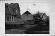 1444 N 8TH ST, a Dutch Colonial Revival barn, built in Manitowoc, Wisconsin in .