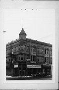 921 S 8TH ST, a Queen Anne retail building, built in Manitowoc, Wisconsin in 1899.