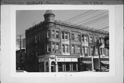 921 S 8TH ST, a Queen Anne retail building, built in Manitowoc, Wisconsin in 1899.