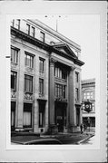 922-930 S 8TH ST, a Neoclassical/Beaux Arts bank/financial institution, built in Manitowoc, Wisconsin in 1927.