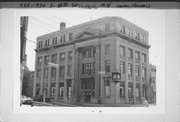 922-930 S 8TH ST, a Neoclassical/Beaux Arts bank/financial institution, built in Manitowoc, Wisconsin in 1927.