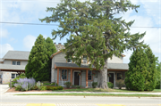 N168 W22022 MAIN ST, a Gabled Ell house, built in Polk, Wisconsin in 1844.