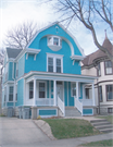 2753 N HACKETT AVE, a Dutch Colonial Revival house, built in Milwaukee, Wisconsin in 1895.