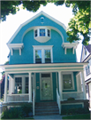 2753 N HACKETT AVE, a Dutch Colonial Revival house, built in Milwaukee, Wisconsin in 1895.