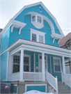 2753 N HACKETT AVE, a Dutch Colonial Revival house, built in Milwaukee, Wisconsin in 1895.