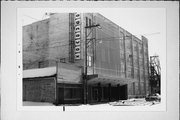 1009-1011 S 10TH ST, a Other Vernacular retail building, built in Manitowoc, Wisconsin in 1915.