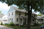 812-814 HUBBARD ST, a Colonial Revival/Georgian Revival duplex/two-flat, built in Green Bay, Wisconsin in 1909.