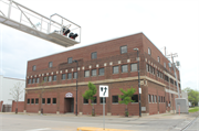 201-209 W WALNUT ST, a Commercial Vernacular automobile showroom, built in Green Bay, Wisconsin in 1916.