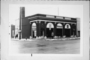 822 FRANKLIN ST, a Neoclassical/Beaux Arts automobile showroom, built in Manitowoc, Wisconsin in 1922.