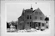 1111 HURON ST, a Queen Anne house, built in Manitowoc, Wisconsin in 1898.