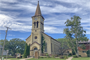 307 N MAIN ST, a Romanesque Revival church, built in Juneau, Wisconsin in 1903.