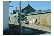 107 N RAILROAD ST, a Commercial Vernacular small retail building, built in Eagle River, Wisconsin in 1888.