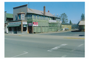 107 N RAILROAD ST, a Commercial Vernacular small retail building, built in Eagle River, Wisconsin in 1888.