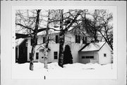1415 MICHIGAN AVE, a Colonial Revival/Georgian Revival house, built in Manitowoc, Wisconsin in 1921.
