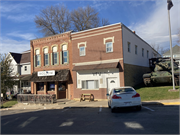 102 W MAIN ST, a Commercial Vernacular large retail building, built in Montfort, Wisconsin in 1894.